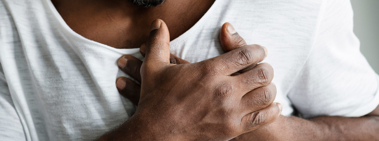 Black man having a heart attack